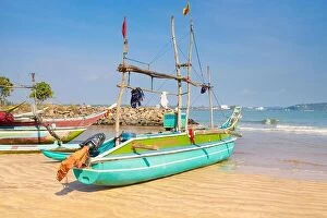 Images Dated 18th January 2012: Sri Lanka - Galle, traditional wooden painted fishing boats in the port