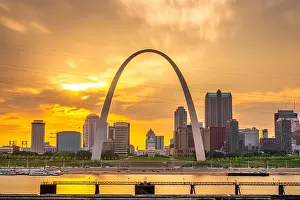 St. Louis, Missouri, USA downtown cityscape on the Mississippi River at sunset