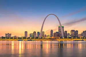 St. Louis, Missouri, USA downtown cityscape on the river at dusk
