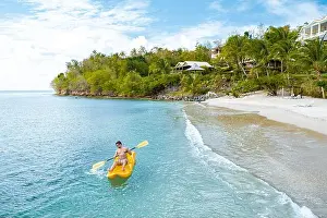 Honeymoon Prints: St Lucia caribbean sea, young guy on vacation at the tropical island Saint Lucia