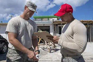 Saipan Prints: Staff Sgt. Carl Vanlandingham, 36th Civil Engineer Squadron structural craftsman and Staff Sgt