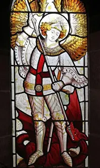 Angels Prints: Stained Glass window depicting Saint Michael (archangel Michael) slaying Satan as a dragon