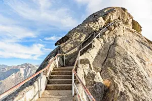 Handrail Prints: Stairway leading up a roacky mountaintop on a sunny autumn day
