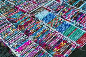 Handicraft Prints: The stand with multicolored bracelets with the different names