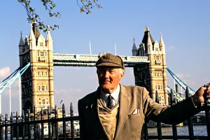 Tower Bridge Prints: Stately Englishman in front of the famous Tower Bridge in London England