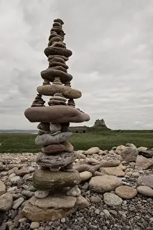 Tidal Prints: Statue of St Aidan in St Mary's Churchyard on Lindisfarne, Northumberland, England