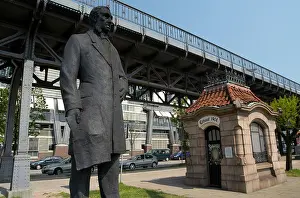 Statue of William Lindley and historic sluice house in the street Baumwall'. Hamburg, Germany