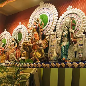 Indian Culture Prints: Statues of Hindu gods in a Durga puja pandal, Kolkata, West Bengal, India