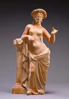 Aphrodite Prints: Statuette of Aphrodite Leaning on a Pillar; Unknown; Tanagra