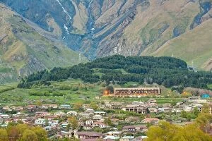 Aerial Landscape Collection: Stepantsminda Village At Evening Or Night Time On Mountain Background In Kazbegi District