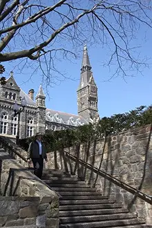 Campanile Prints: Stone stairway leads down from campus of Georgetown University in Washington DC USA with Healy Hall in background