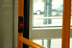 Puerto Prints: A stop button in a local train