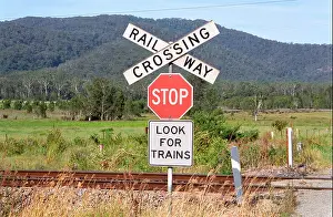 Red Cross Prints: Stop sign at railway crossing in rural Australia