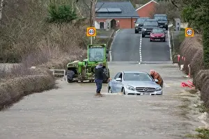 Storm Dennis Cars in Floods, these images where taken Nr Welshpool in Powys Mid-Wales