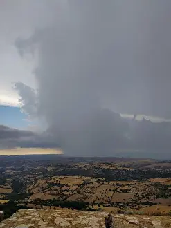 Thunderstorm Prints: Storm front on the rolling hills: a clash between the forces of nature