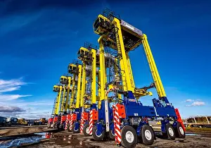 Lined Up Prints: Straddle Carriers at dockside