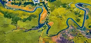 Straight dawn panoramic view from flying drone of bridge over Seret river