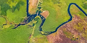 Straight dawn panoramic view from flying drone of bridge over Seret river