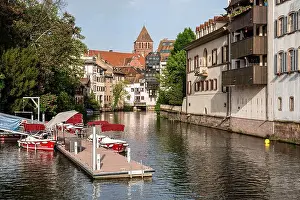 Real Estate Prints: Strasbourg (north-eastern France): traditional houses on the banks of the river Ill in the district of Petite France