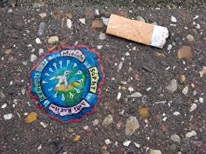 Graffitti Prints: Street Art: A Painting on Discarded Chewing Gum on a City Street