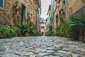 Discovering Prints: empty street with cobble stones in Valldemossa, Mallorca, Spain