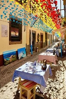 Images Dated 28th June 2013: Street decorated with paper flowers on feast of Madeira, Funchal old town, Madeira Island, Portugal