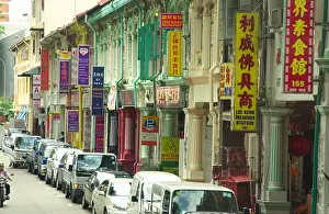 Singapore Prints: Street scene with cars and shop signs in Little India in Singapore