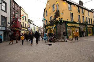 Eire Prints: Street scene in Galway City featuring musician and dancer busking