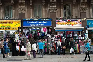 Leicester Square Prints: Street Scene of People / Tourists at the Souvenir Shops, Leicester Square, London