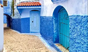 Colombian Prints: Streets and colored houses, View from the city street where all buildings are painted only in blue