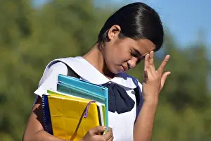Worry Prints: Stressful Youthful Filipina Student Teenager School Girl Wearing Uniform