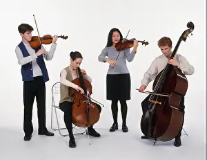 Practising Prints: String quartet consisting of a group of teenagers playing violin