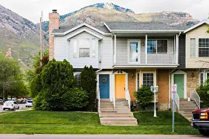 Townhouse Prints: Strip of townhouses with colorful doors, two story student housing