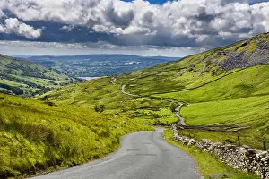 Quarry Prints: The Struggle road at Kirkstone Pass leading to Windermere lake Ambleside with Snarker Pike of Red Screes mountain