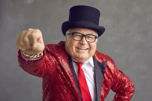 Grandpa Prints: Studio portrait of funny rich old man in glasses, sequin jacket and black top hat