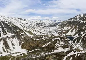 Stunning aerial view of the Gotthard pass and road in the swiss alps between the Canton of Ticino and Uri in Switzerland
