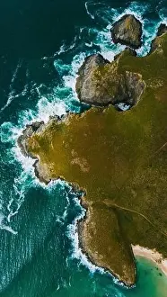 Vacation Spot Prints: Stunning drone capture over Galicia showcasing the dramatic interplay between rocky cliffs