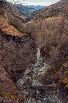 Mountain Ridge Prints: Stunning drone footage of an alpine valley in Autumn with different coloured trees