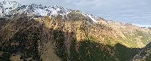 Mountain Ridge Prints: Stunning drone footage of an alpine valley in Autumn with different coloured trees