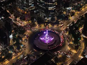 Mexico Prints: Stunning drone shot of Mexico City's iconic Angel of Independence monument at night