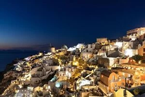 Images Dated 9th October 2019: Stunning night view of fabulous caldera view, picturesque village of Oia with traditional white