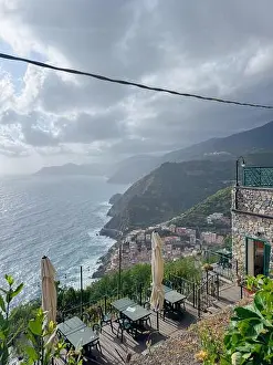 Summer Vacation Prints: Stunning scenic view from a mountain terrace overlooking a quaint village by the sea