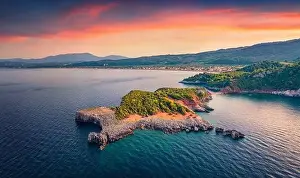 Euboea Prints: Stunning sunset on Saint Basil Beach with Agkali village on background