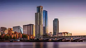 City Lights Prints: A stunning wide-angle shot of the modern London skyline featuring the iconic One Blackfriars tower reflected