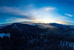 Hill Glacier Prints: Stunning winter panorama with trees and hills covered with snow on a sunny frosty day