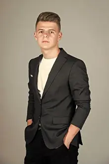 Groomed Prints: stylish boy with groomed hair. trendy looking teenager