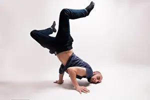 Flexibility Prints: Stylish dancer doing breakdance figures