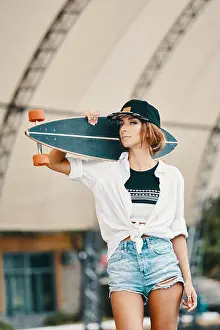 Skateboard Prints: Stylish girl showing attitude close up portrait