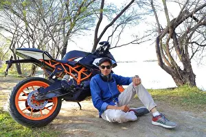Biking Prints: Stylish male model with motorcycle or sports bike