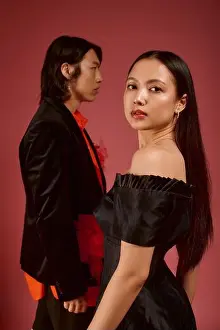 Intimacy Prints: Stylish young asian couple confidently expresses love in a modern artistic setting